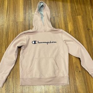 Champion pink girls hoodie. The hoodie is grey inside
